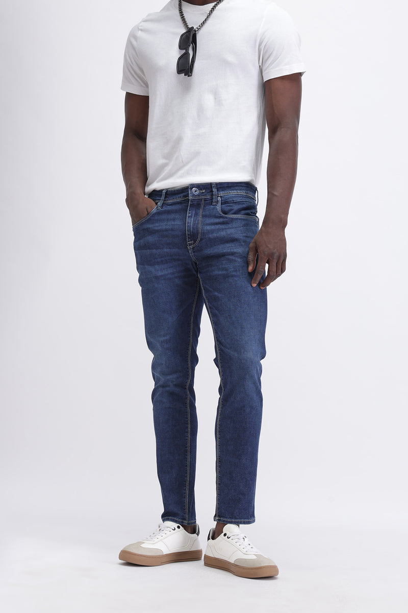 SLIM FIT MID WASH JEANS