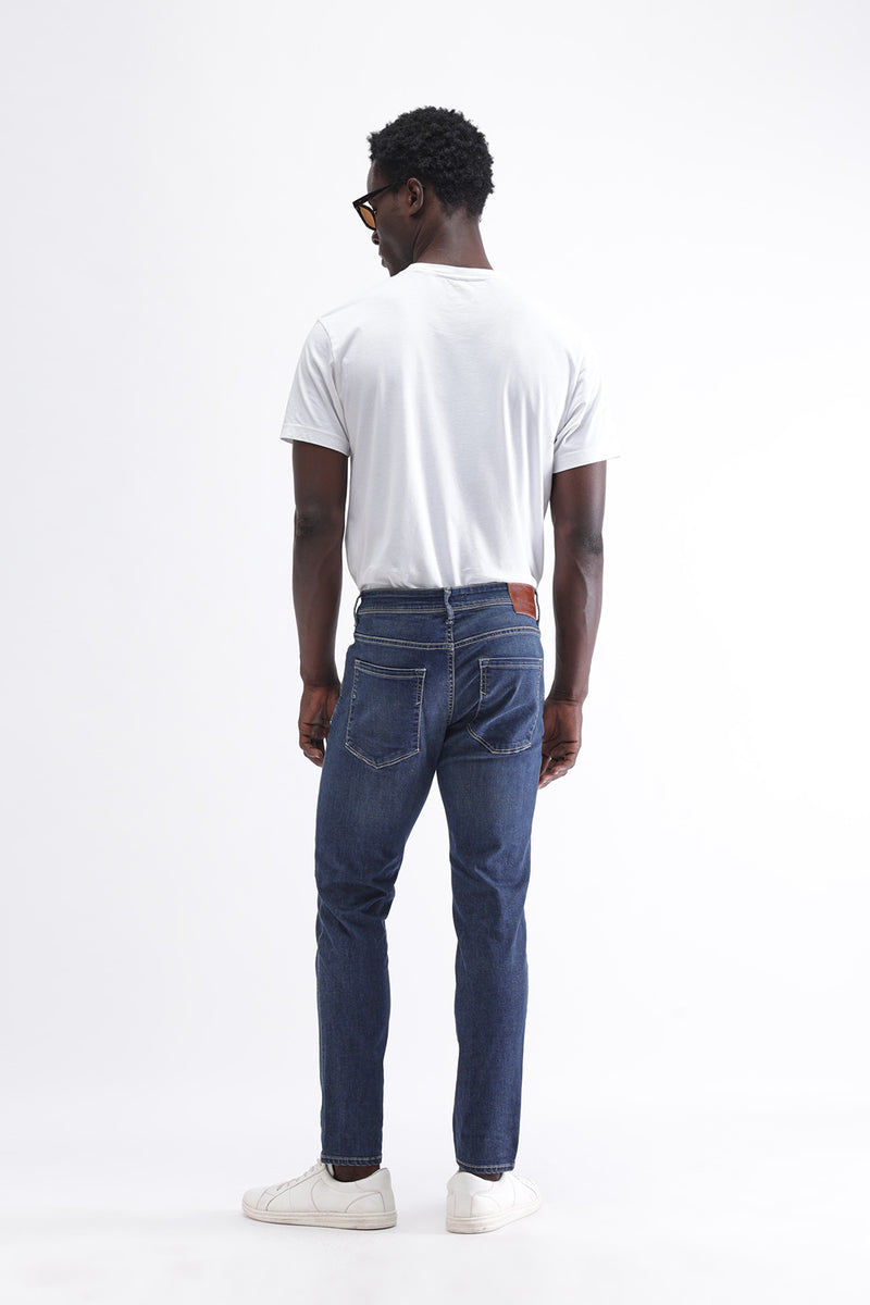 SLIM FIT MID WASH JEANS