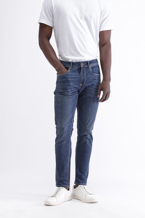 SLIM FIT MID WASH JEANS