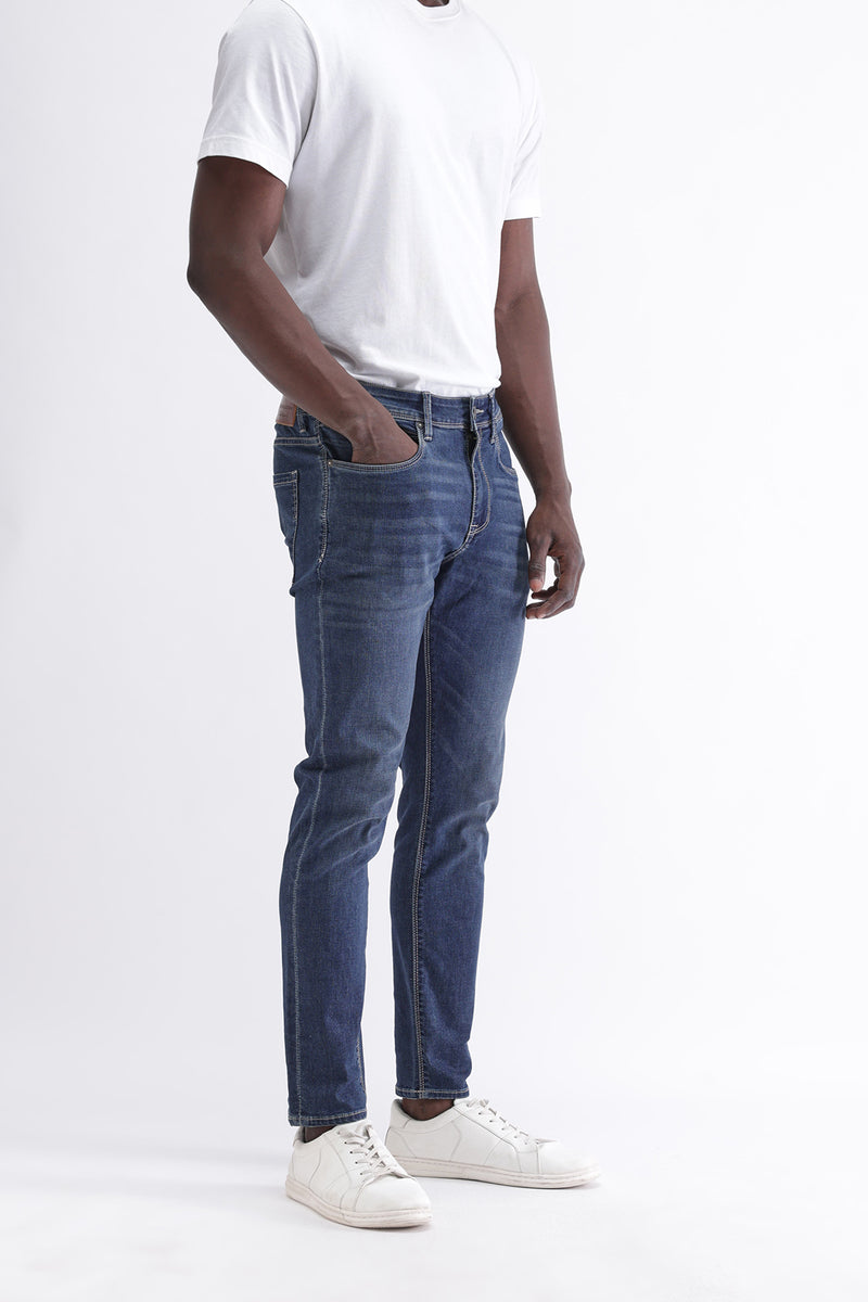 SLIM FIT MID WASH JEANS